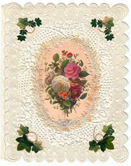 Roses and ivy on a greetings card with lacy white border Roses and ivy on a greetings card with lacy white border