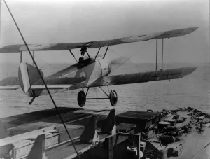 Prints of Sqn Ldr Rutland flying a Sopwith Pup off HMS Yarmouth on 28 June 1917. The Pup is believed to be N6431. Date: 1917 Rutland Prints: Sqn Ldr Rutland flying a Sopwith Pup off HMS Yarmouth Print 1917