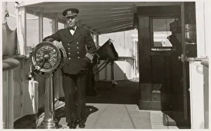 Royal Navy captain on bridge of warship Royal Navy captain on bridge of warship