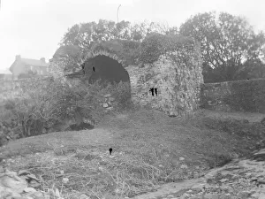 Ruined defences near a fishpond, St Davids, South Wales Ruined defences near a fishpond, St Davids, South Wales