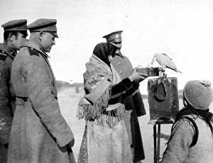 Russian soldiers seeking to know the future: A Gispys parakeet telling the mens fortunes Russian soldiers seeking to know the future: A Gispys parakeet telling the mens fortunes