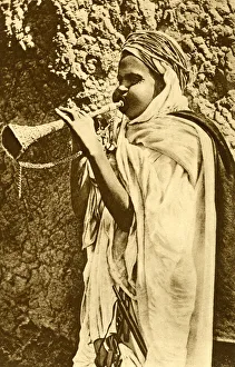 Saharan boy with trumpet, Algeria, North Africa Saharan boy with trumpet, Algeria, North Africa