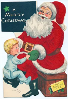 Santa Claus with boy on a Christmas card Santa Claus with boy on a Christmas card
