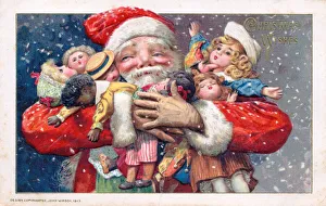 Santa Claus holding presents on a Christmas postcard Santa Claus holding presents on a Christmas postcard