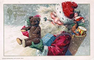 Santa Claus holding a teddy bear on a Christmas postcard Santa Claus holding a teddy bear on a Christmas postcard