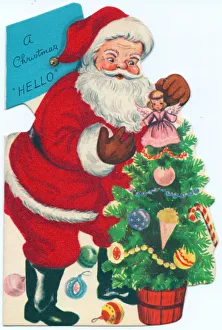Santa Claus with tree on a Christmas card Santa Claus with tree on a Christmas card