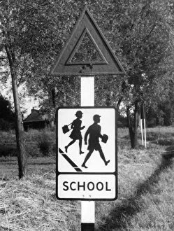 School - the pictorial traffic sign which replaced a former torch sign School - the pictorial traffic sign which replaced a former torch sign