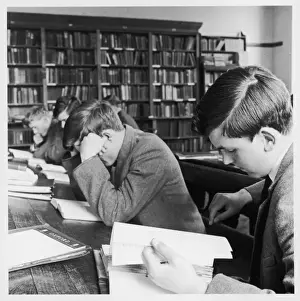 Historical Education Images Prints: Schoolboys studying in school library