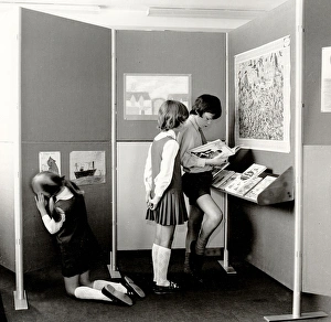 Schoolchildren in a school display area Schoolchildren in a school display area