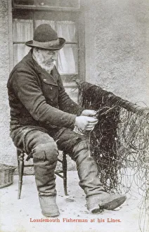 Scotland - Lossiemouth Fisherman mending his lines Scotland - Lossiemouth Fisherman mending his lines