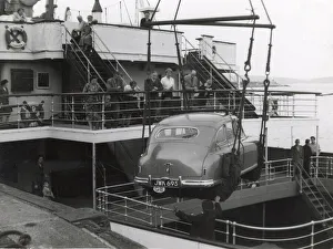 Shipping a British car by ferry, Fishguard, South Wales. Date: 1950s Shipping a British car by ferry, Fishguard, South Wales. Date: 1950s