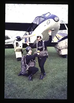 Two Sky Divers Preparing for a Jump Print