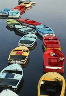 Small colourful boats for hire on the River Dee, Chester Small colourful boats for hire on the River Dee, Chester
