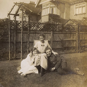 Soldier with fiancee and her mother in a garden, WW1 Soldier with fiancee and her mother in a garden, WW1