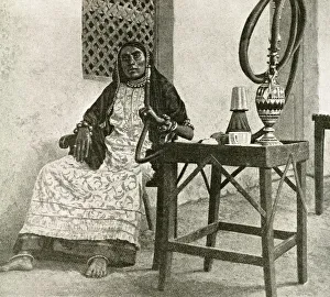 Somali woman with hookah, Gulf of Aden, Arabia Somali woman with hookah, Gulf of Aden, Arabia