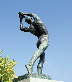 Statue of Discobolus in front the Panathenaic Stadium (Kalli Statue of Discobolus in front the Panathenaic Stadium (Kalli