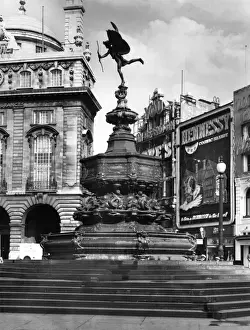 Prints of The famous statue of the Greek god of love, Eros, Piccadilly Circus, London, was sculpted by Alfred Gilbert in 1893. It was originally called the Shaftesbury Monument. Date: 1893 Piccadilly Circus Prints: Statue of Eros Print, Piccadilly Circus, London 1893