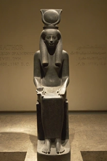 Statue of the goddess Hathor, depicted with cow horns and so Statue of the goddess Hathor, depicted with cow horns and so