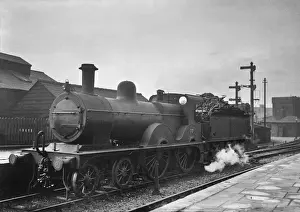 Historical Steam Engine Prints: Steam engine in a station