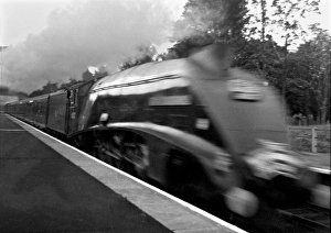 Steam train travelling at high speed Steam train travelling at high speed