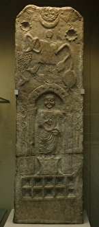 Stela relief depicting a male figure in a niche and a Tanit Stela relief depicting a male figure in a niche and a Tanit