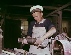 Traditional Craftsman Tools Prints: Stonemason working with granite in a workshop