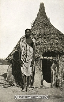 Sudan - A Shilluk man outside his house Sudan - A Shilluk man outside his house