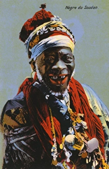Sudanese old man with a very toothy grin Sudanese old man with a very toothy grin