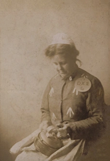 Suffragette in Prison Dress Cleaning Kettle Suffragette in Prison Dress Cleaning Kettle