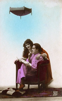 Very surreal French pair below a hanging lantern Very surreal French pair below a hanging lantern