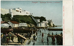 Tangier, Morocco - Loading and unloading bulls and wood Tangier, Morocco - Loading and unloading bulls and wood