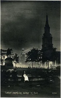 Trafalgar Squre by night, London. Date: circa 1909 Trafalgar Squre by night, London. Date: circa 1909