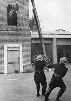National Fire Service History Prints: Trainee lowered from tower during exercise drill, WW2