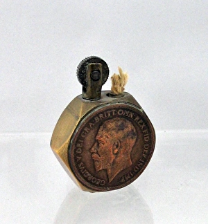 Trench Art lighter, hexagonal with George V pennies Trench Art lighter, hexagonal with George V pennies