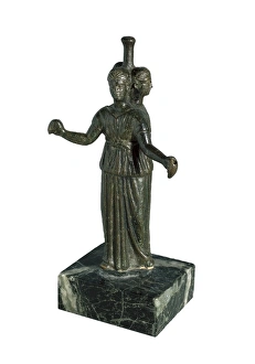 Triple form of Hecate around a column. Ancient Greek Triple form of Hecate around a column. Ancient Greek