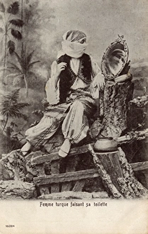 A Turkish Woman living in Egypt, looking into a mirror A Turkish Woman living in Egypt, looking into a mirror