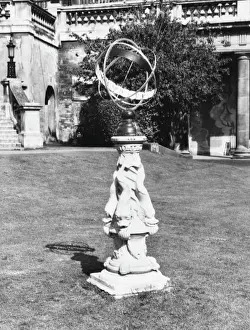 Prints of An unusual armillary sphere sundial with a base with fish sculpted into it, at Bath, Somerset, England Bath Prints: Armillary Sphere Sundial Print with Fish Base