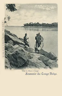 Upper Congo, Africa - Four tribesmen and their dugout canoe Upper Congo, Africa - Four tribesmen and their dugout canoe
