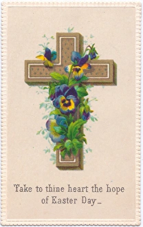 Variegated pansies and a cross on an Easter card Variegated pansies and a cross on an Easter card