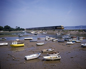 View of boats in the harbour, with train, Cockwood, Devon View of boats in the harbour, with train, Cockwood, Devon