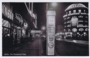 A view of Potsdamer Platz at night with Haus Vaterland on th A view of Potsdamer Platz at night with Haus Vaterland on th