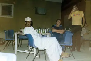 1976 Print of White Men Drinking in Oman