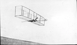 Wilbur Wright in the 1902 glider in flight Wilbur Wright in the 1902 glider in flight