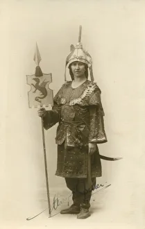 A woman in an interesting militaristic exotic costume, holding a standard. Date: c A woman in an interesting militaristic exotic costume, holding a standard. Date: c