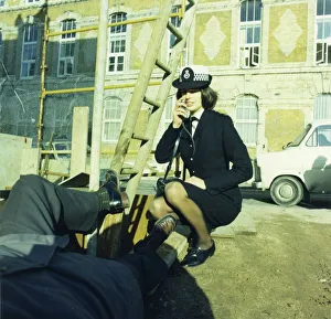 Woman police officer attending an accident Woman police officer attending an accident