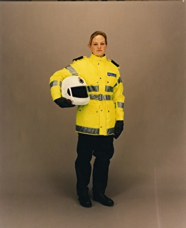 Woman police officer in reflective uniform, London Woman police officer in reflective uniform, London