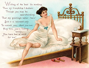Woman sitting on a bed on a greetings card Woman sitting on a bed on a greetings card