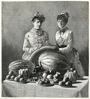 Two women with prize fruit at a Kentucky fair, USA Two women with prize fruit at a Kentucky fair, USA