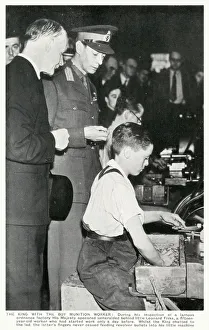 WW2 - Home Front - King George VI meets a young boy munition worker (15 year-old Leonard WW2 - Home Front - King George VI meets a young boy munition worker (15 year-old Leonard