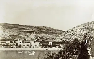 Prints of Xlendi Bay - Gozo - Malta. This site is now very developed - the smallholding (centre) replaced by a large Hotel! Date: circa 1920s Malta Prints: Xlendi Bay - Gozo, Malta circa 1920s Print